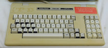 Load image into Gallery viewer, TRS-80 model 4P computer 26-1080A screen powersUp but NON-OP w/ stickers Vintage