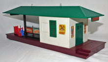 Load image into Gallery viewer, Lionel 356 Operating Freight Station w/ red & green carts boxed and complete