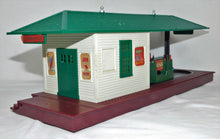 Load image into Gallery viewer, Lionel 356 Operating Freight Station w/ red & green carts boxed and complete