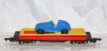 Load image into Gallery viewer, American Flyer 715 Unloading flatcar w/original Tootsietoy Blue Racer Works '52