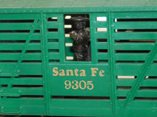 Load image into Gallery viewer, Lionel Trains 9305 Santa Fe Outlaw Gunfighter bobbing Outlaw cattle car Western
