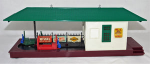 Lionel 356 Operating Freight Station w/ red & green carts boxed and complete