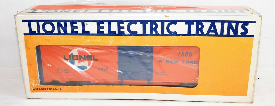 Lionel Lines 6-9492 Boxcar 1986 Trains A New Tradition logo SEALED Orange/Blue