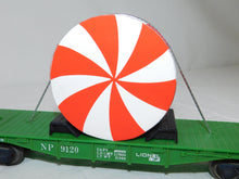 Load image into Gallery viewer, Lionel Depressed Center Flatcar w/ Giant Christmas Peppermint Disc Northern Pacific
